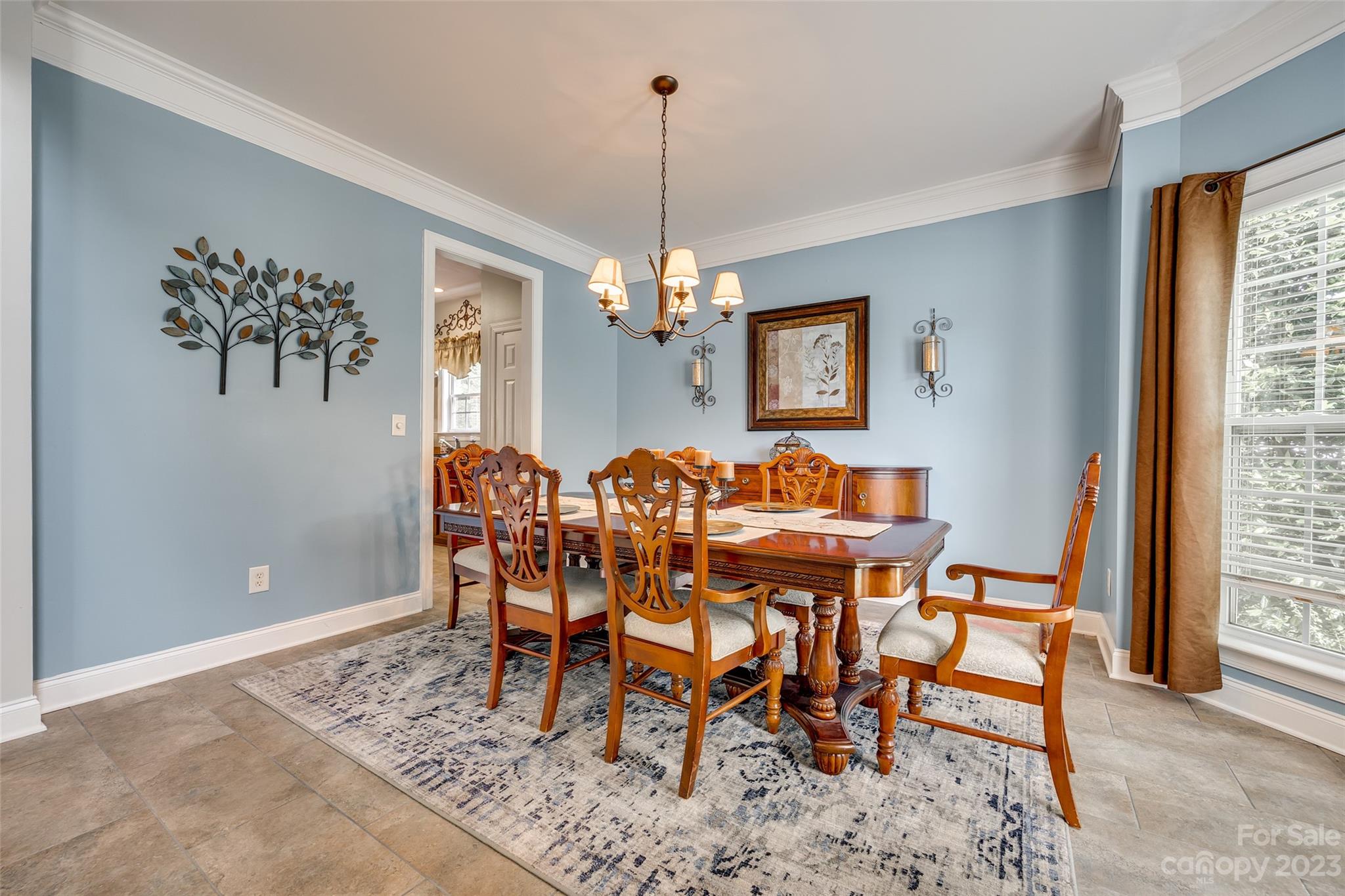 5540 Alexandrite Way Fort Mill, SC 29708 - Photo 8 of 46 a view of a dining room with furniture window and wooden floor