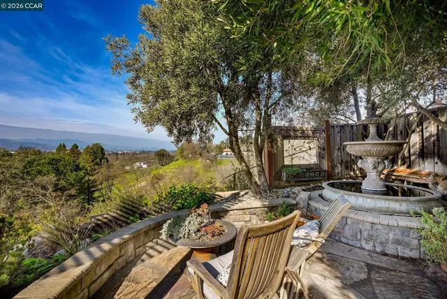 a view of a chairs and table on the terrace