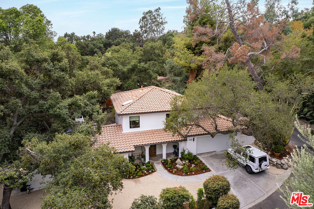 1700 Old Grove Road Pasadena, CA 91107 - Photo 1 of 33 an aerial view of a house with garden space and trees