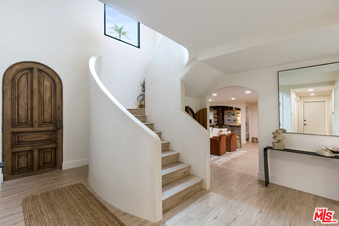 1700 Old Grove Road Pasadena, CA 91107 - Photo 19 of 33 a view of entryway and hall with wooden floor