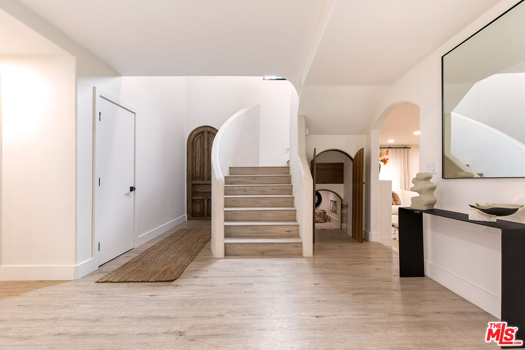 1700 Old Grove Road Pasadena, CA 91107 - Photo 20 of 33 a view of entryway and hall with wooden floor