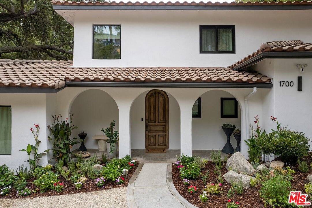 1700 Old Grove Road Pasadena, CA 91107 - Photo 2 of 33 a front view of a house