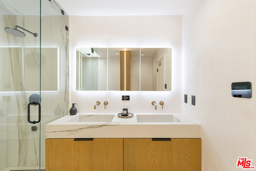 1700 Old Grove Road Pasadena, CA 91107 - Photo 25 of 33 a bathroom with a sink and a mirror