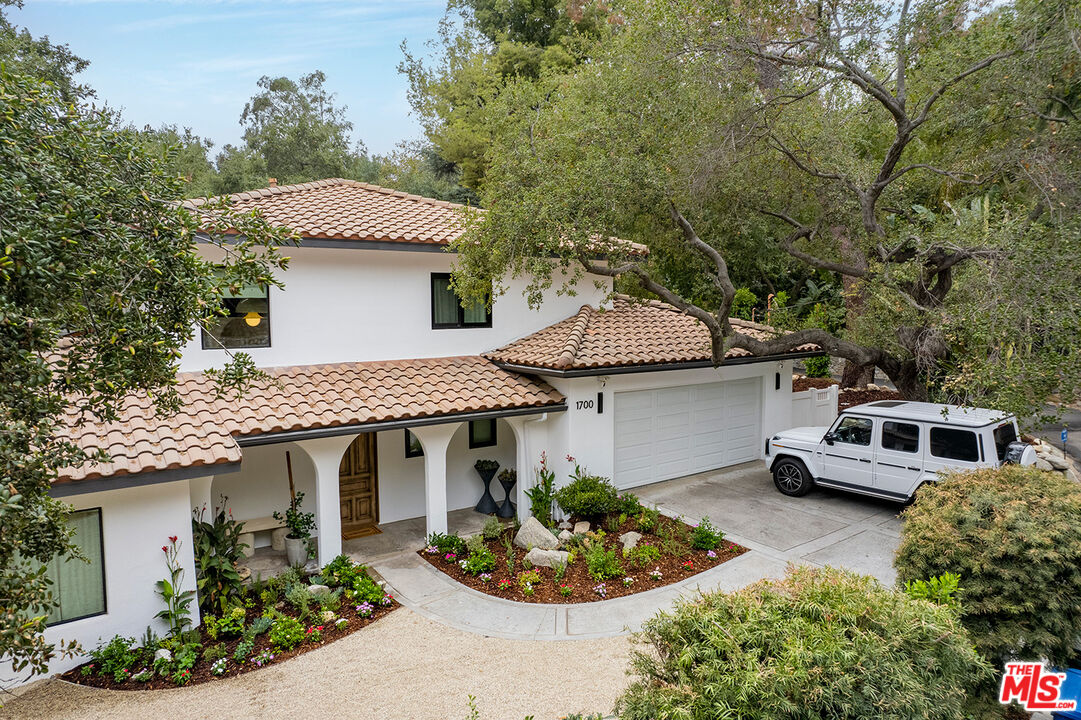 1700 Old Grove Road Pasadena, CA 91107 - Photo 3 of 33 a house view with a garden space