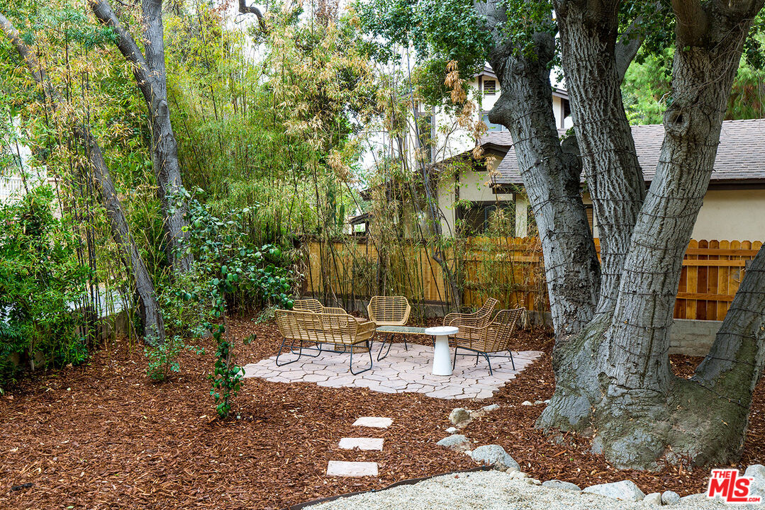 1700 Old Grove Road Pasadena, CA 91107 - Photo 32 of 33 a view of a patio with chairs and potted plants