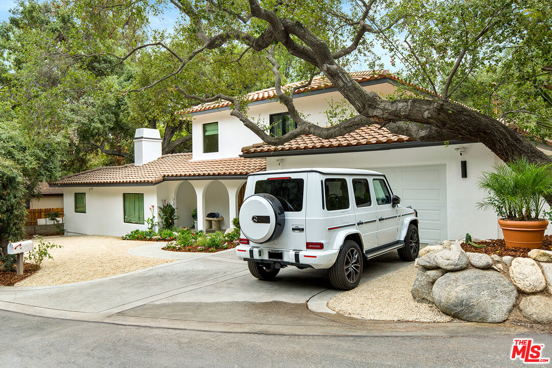 1700 Old Grove Road Pasadena, CA 91107 - Photo 4 of 33 a white house that has a tree in front of it