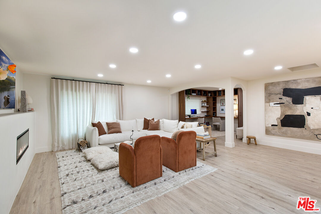 1700 Old Grove Road Pasadena, CA 91107 - Photo 6 of 33 a living room with furniture and a flat screen tv