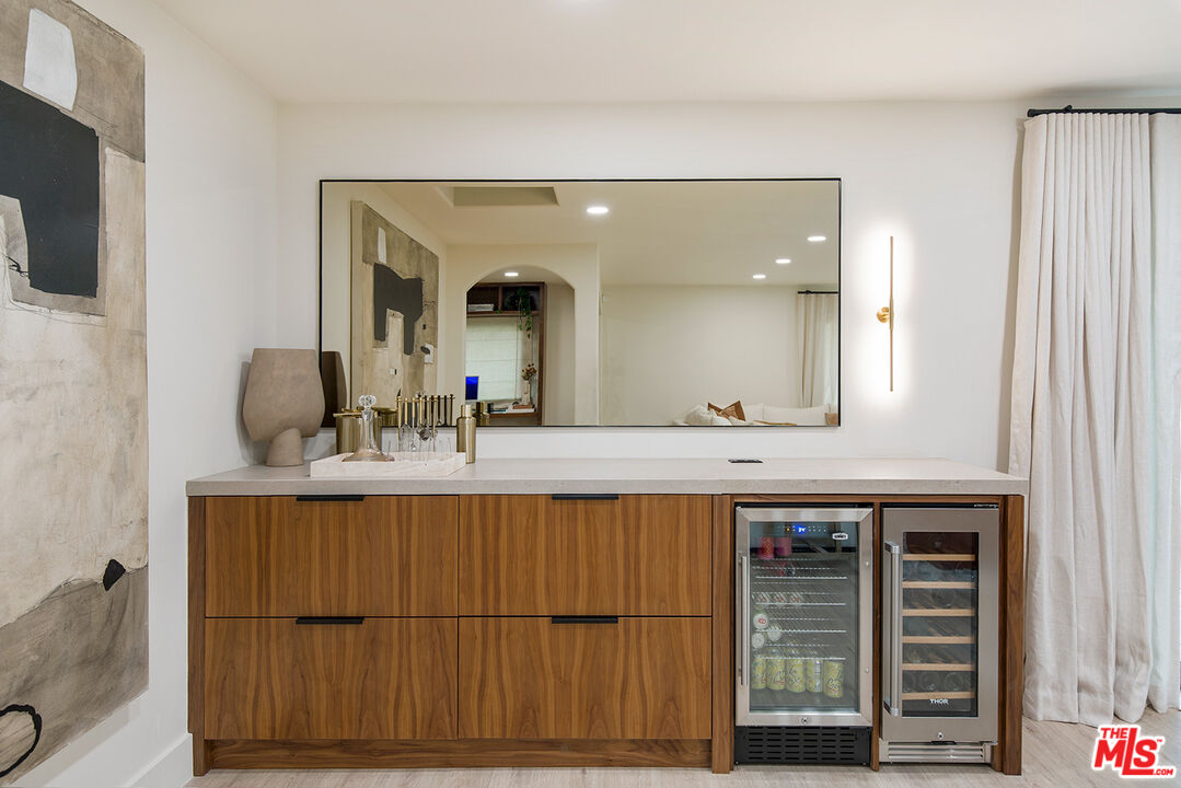 1700 Old Grove Road Pasadena, CA 91107 - Photo 9 of 33 a bathroom with a sink and a mirror