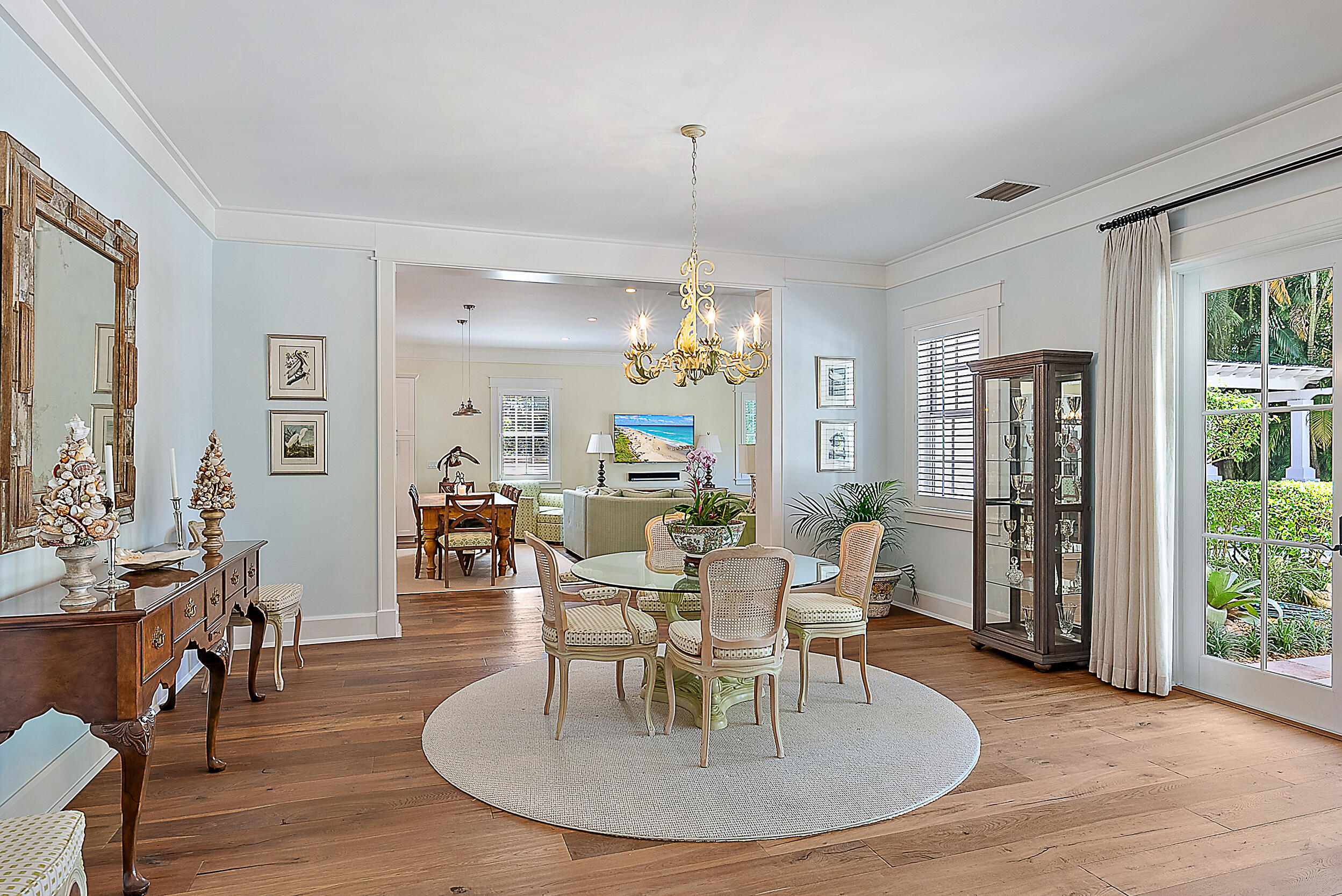 18706 Southeast St Augustine Way Jupiter, FL 33469 - Photo 25 of 74 a view of a dining room with furniture window and wooden floor