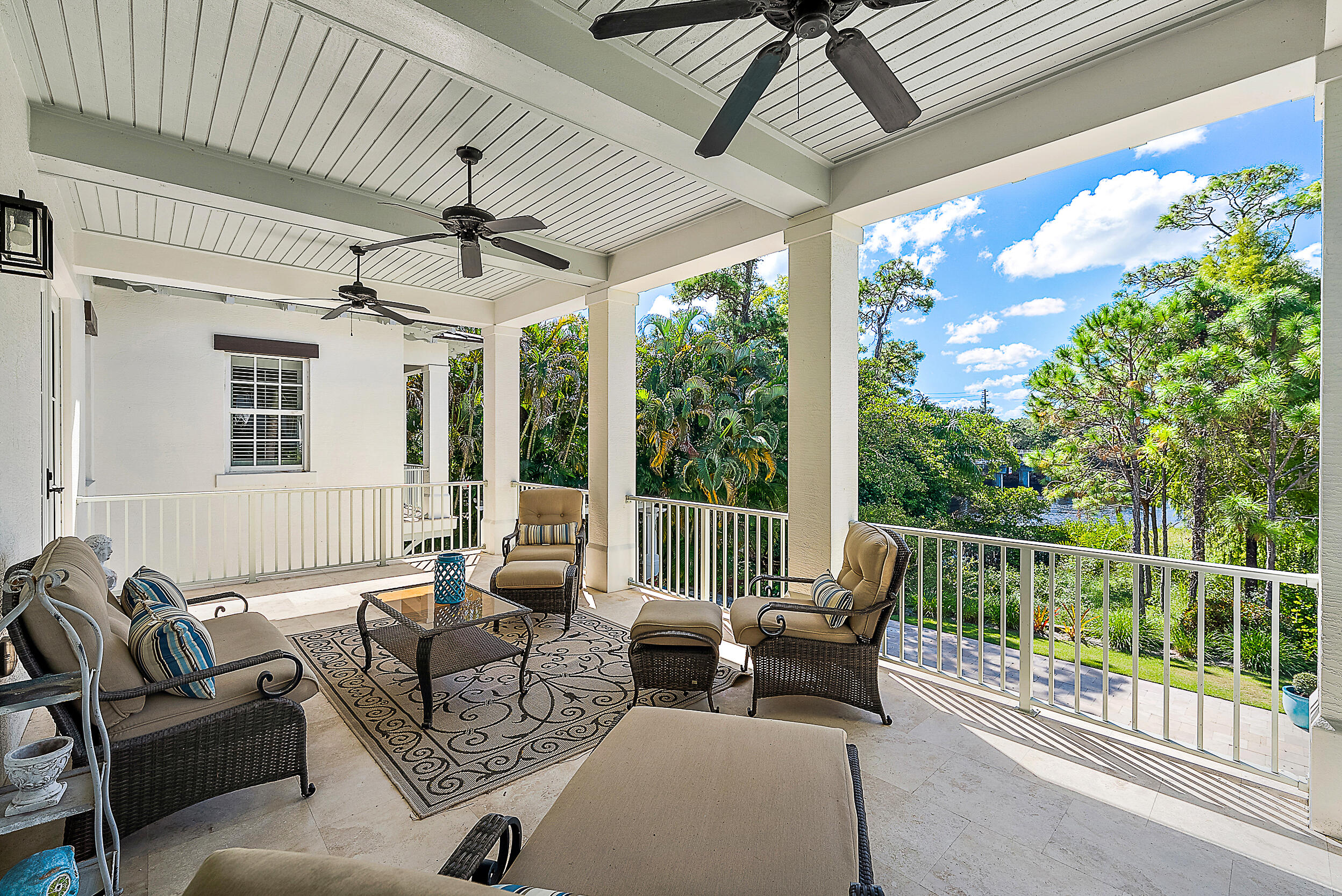 18706 Southeast St Augustine Way Jupiter, FL 33469 - Photo 43 of 74 a outdoor living space with furniture and garden view
