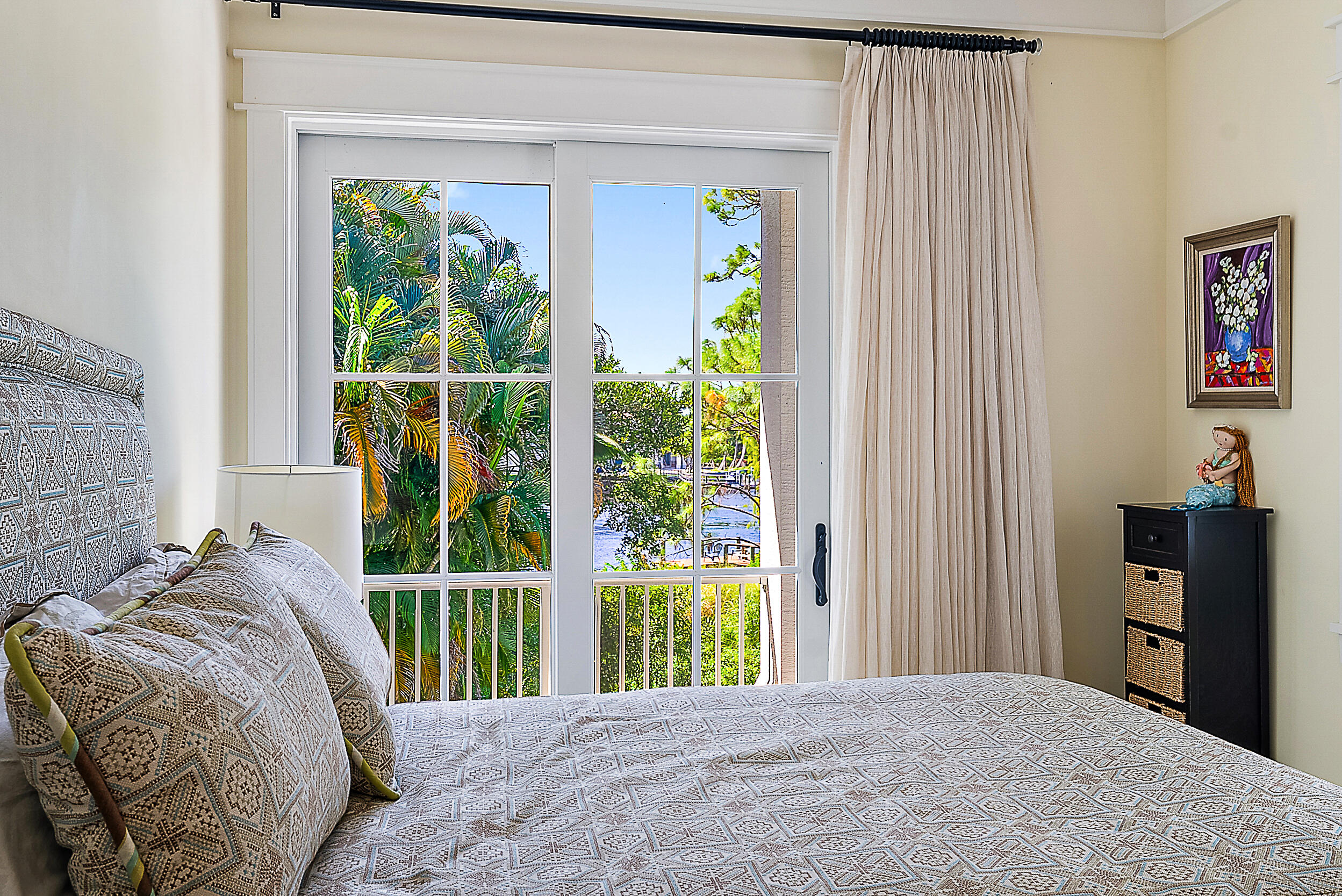 18706 Southeast St Augustine Way Jupiter, FL 33469 - Photo 53 of 74 a bedroom with a bed and a window