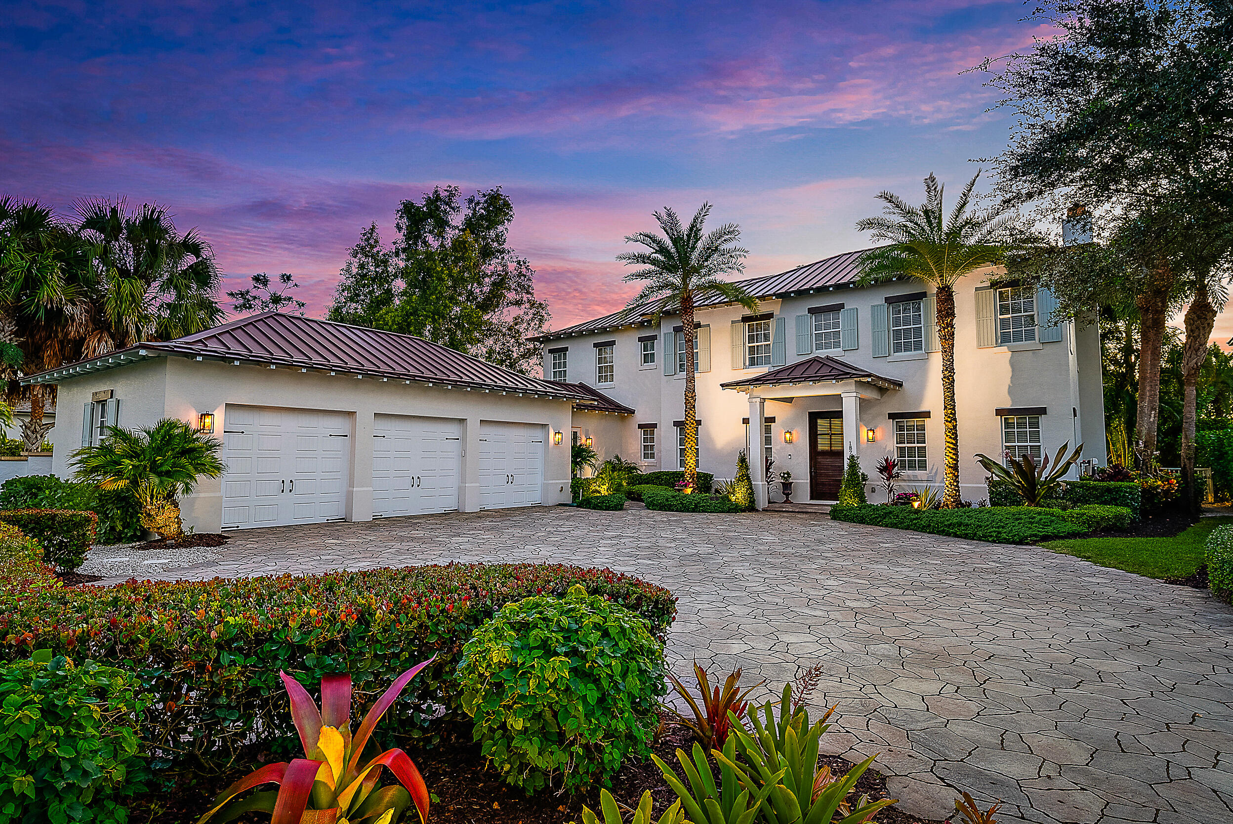 18706 Southeast St Augustine Way Jupiter, FL 33469 - Photo 57 of 74 a view of a front of a house with a yard