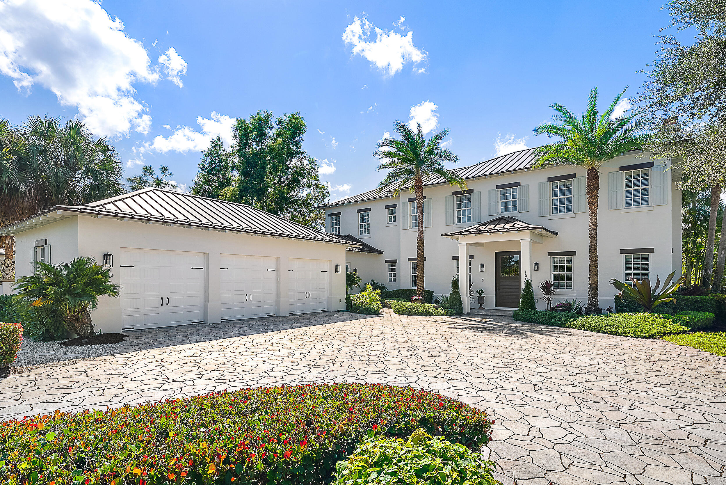 18706 Southeast St Augustine Way Jupiter, FL 33469 - Photo 61 of 74 a view of a house with a yard