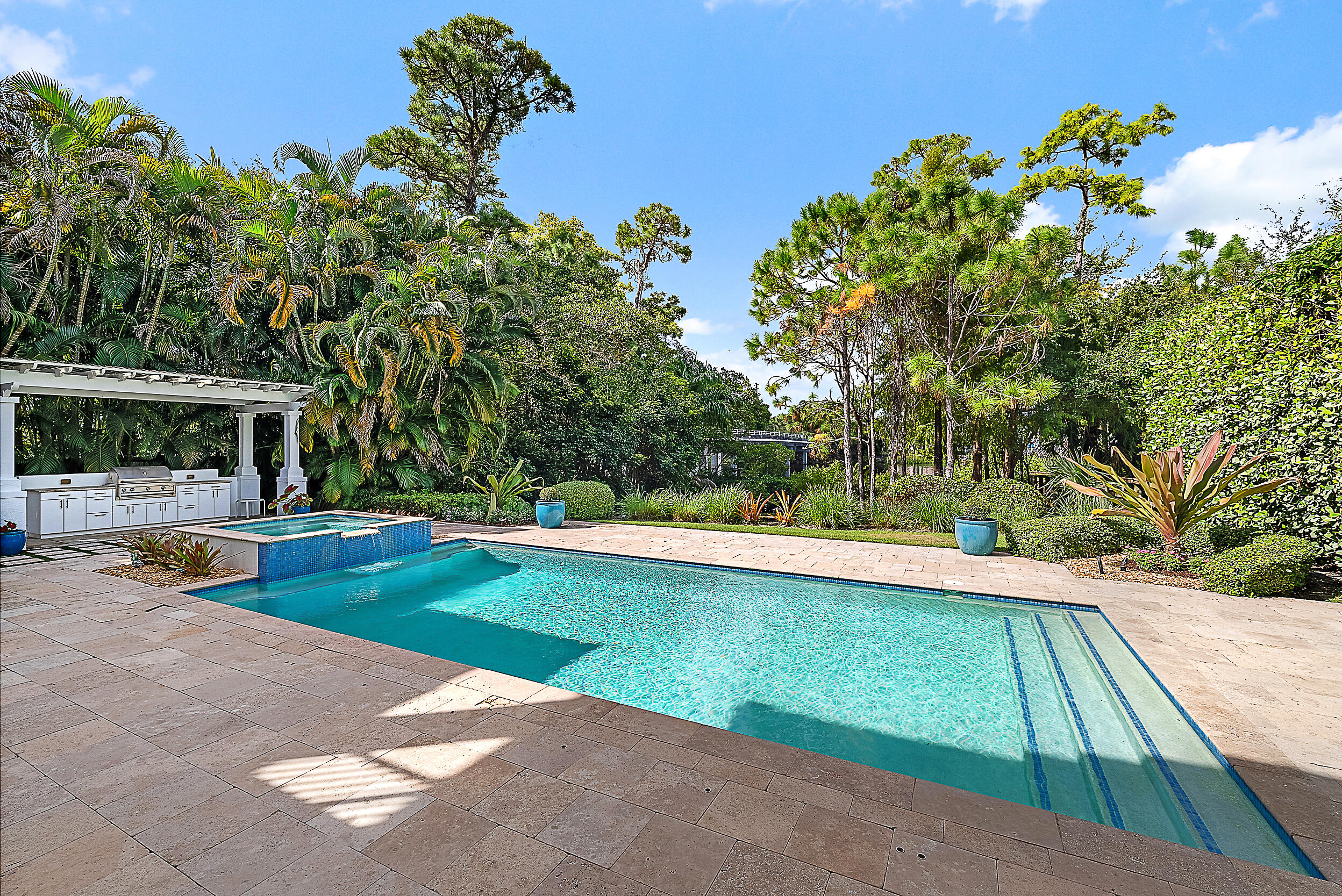 18706 Southeast St Augustine Way Jupiter, FL 33469 - Photo 71 of 74 a view of a patio with swimming pool table and chairs