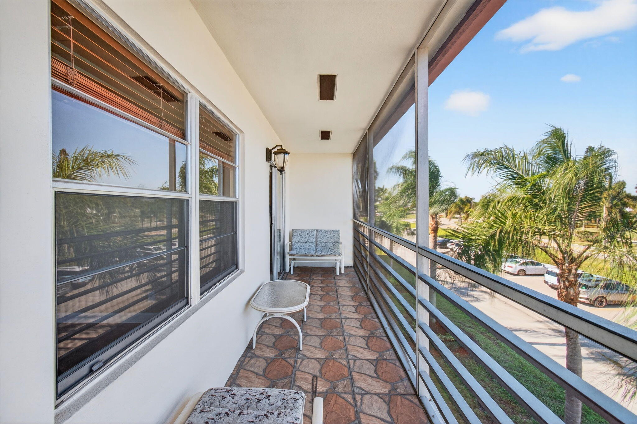 33 Fanshaw A, Unit A Boca Raton, FL 33434 - Photo 47 of 108 17 ft long Screened-In Balcony