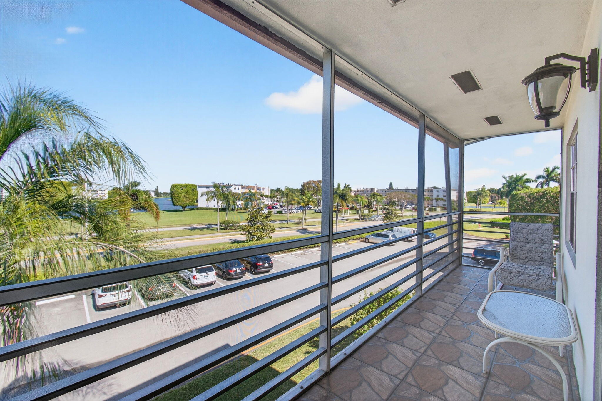33 Fanshaw A, Unit A Boca Raton, FL 33434 - Photo 48 of 108 17 ft long Screened-In Balcony