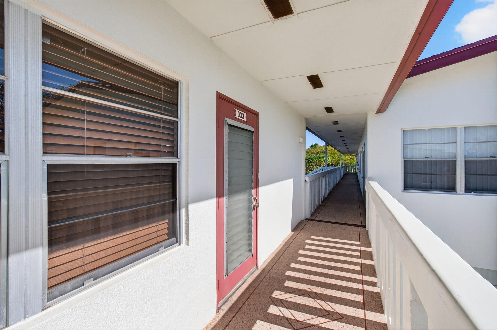 33 Fanshaw A, Unit A Boca Raton, FL 33434 - Photo 8 of 108 Catwalk by the Main Entrance