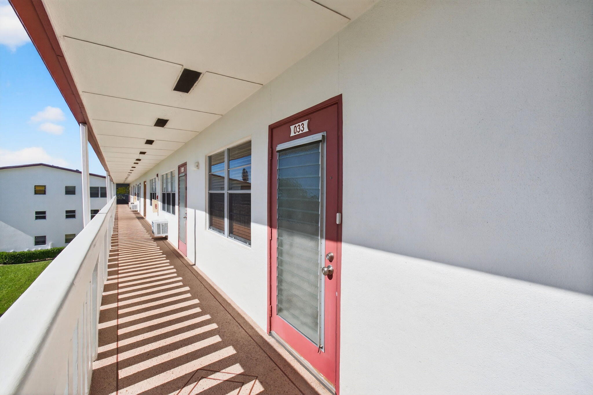 33 Fanshaw A, Unit A Boca Raton, FL 33434 - Photo 9 of 108 Catwalk by the Main Entrance