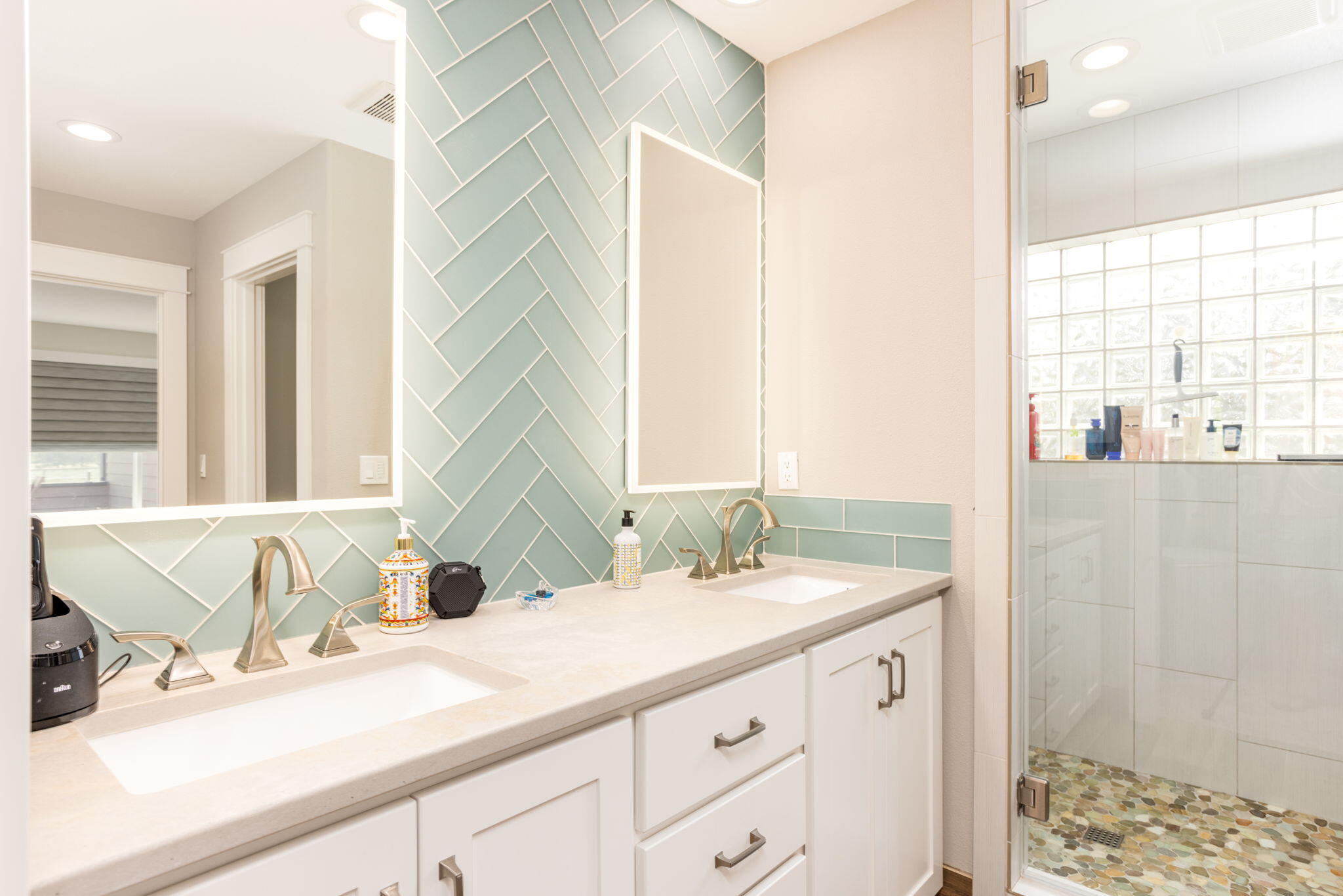 21655 Northeast Butler Market Road Bend, OR 97701 - Photo 13 of 34 a bathroom with a sink and a mirror