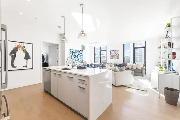 a large white room with many windows