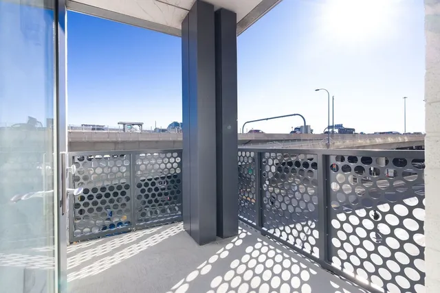 a view of a balcony with an outdoor space