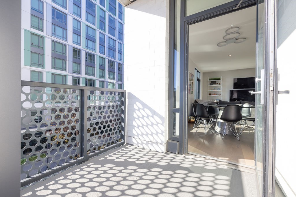 40 Traveler Street, Unit 303 Boston, MA 02118 - Photo 22 of 42 a view of living room and window