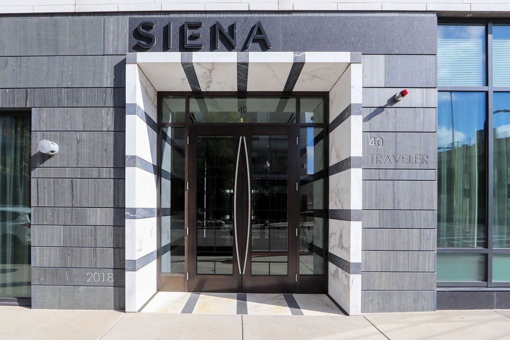 40 Traveler Street, Unit 303 Boston, MA 02118 - Photo 24 of 42 a front view of a house with a glass door