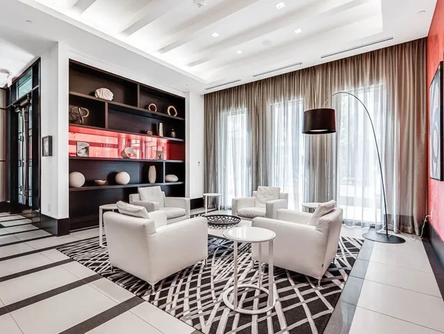 a living room with furniture and window