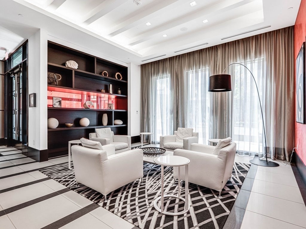 40 Traveler Street, Unit 303 Boston, MA 02118 - Photo 32 of 42 a living room with furniture and window