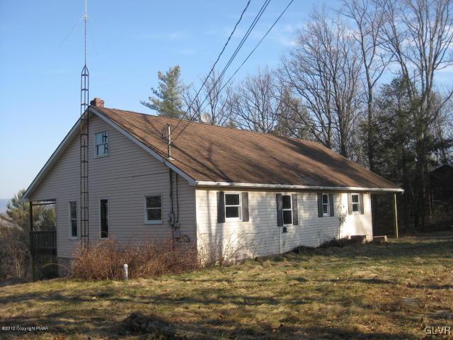 24 Turkey Ridge Kunkletown, PA 18058 - Photo 2 of 9 a front view of a house with a yard