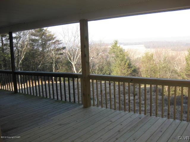 24 Turkey Ridge Kunkletown, PA 18058 - Photo 3 of 9 a view of balcony with wooden floor