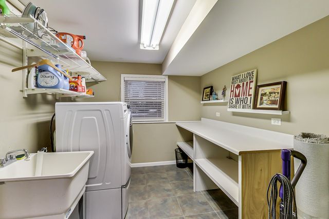 a bedroom with a bed and a television