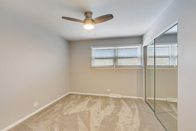 a bathroom with a sink a toilet and bathtub