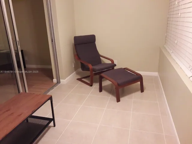 a living room with a chair