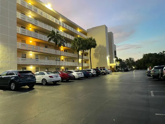 a view of street with parked cars