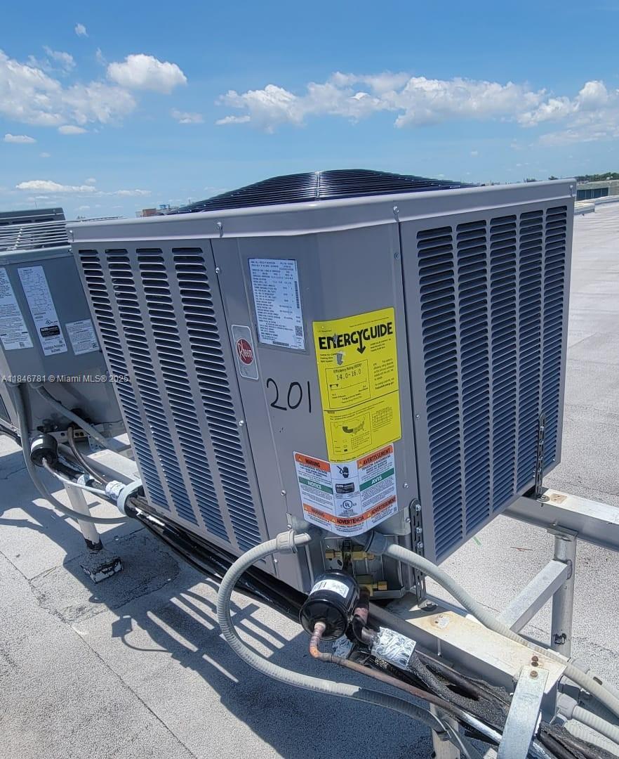 121 Southeast 3rd Avenue, Unit 201 Dania Beach, FL 33004 - Photo 49 of 49 a view of a room with gym equipment