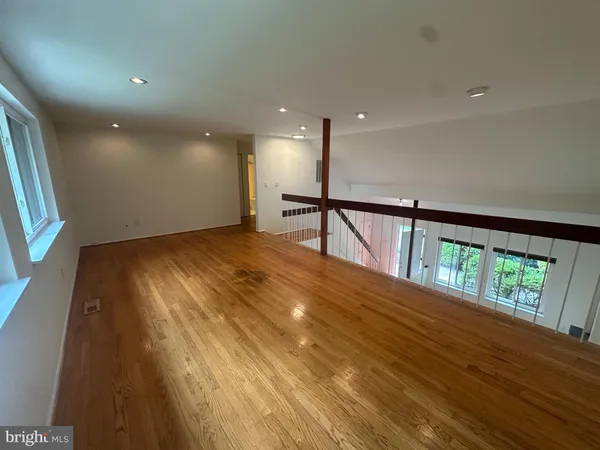 a view of hallway with a large window