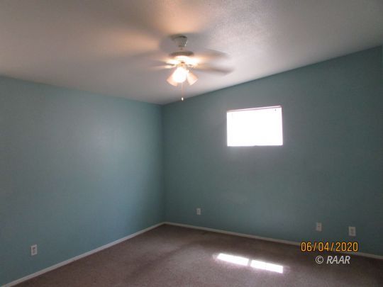 304 North Florence Street Ridgecrest, CA 93555 - Photo 6 of 21 an empty room with a window