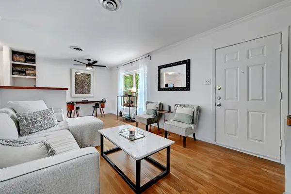 a kitchen with a refrigerator and a sink