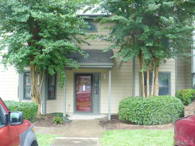 602 Broad Leaf Circle Raleigh, NC 27613 - Photo 1 of 11 front view of a house with a garden