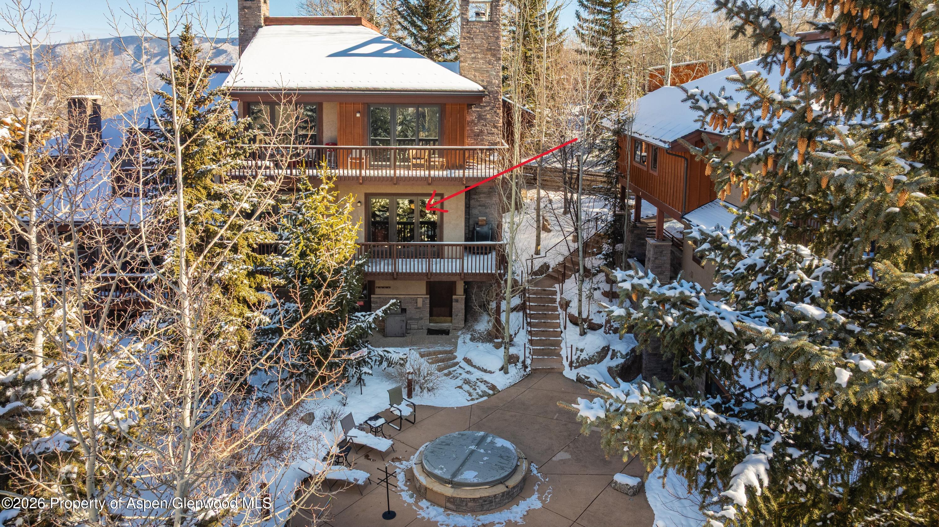 229 Faraway Road, Unit 28 Snowmass Village, CO 81615 - Photo 26 of 30 a front view of a house with garden
