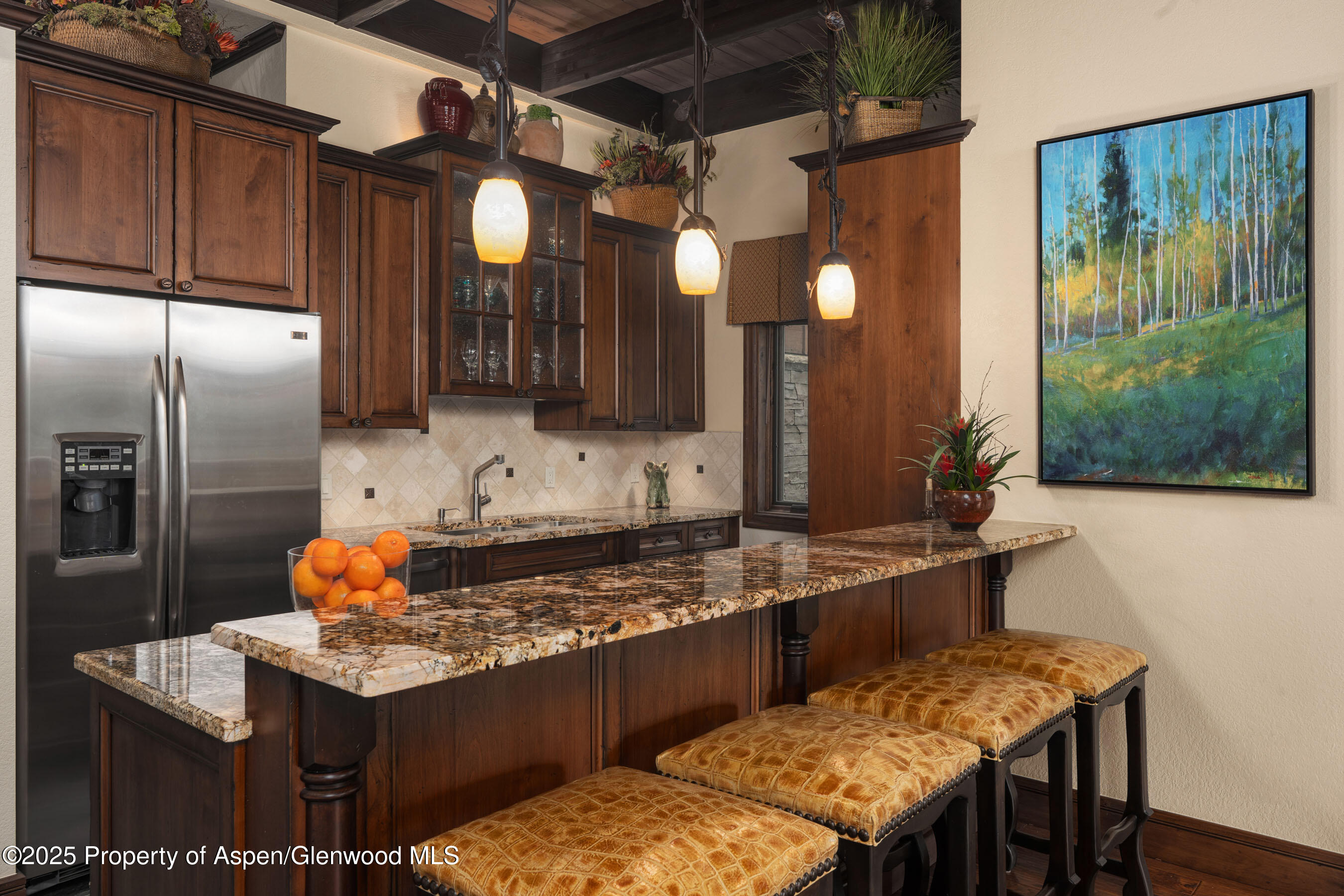 229 Faraway Road, Unit 28 Snowmass Village, CO 81615 - Photo 5 of 25 a kitchen with a stove and a refrigerator
