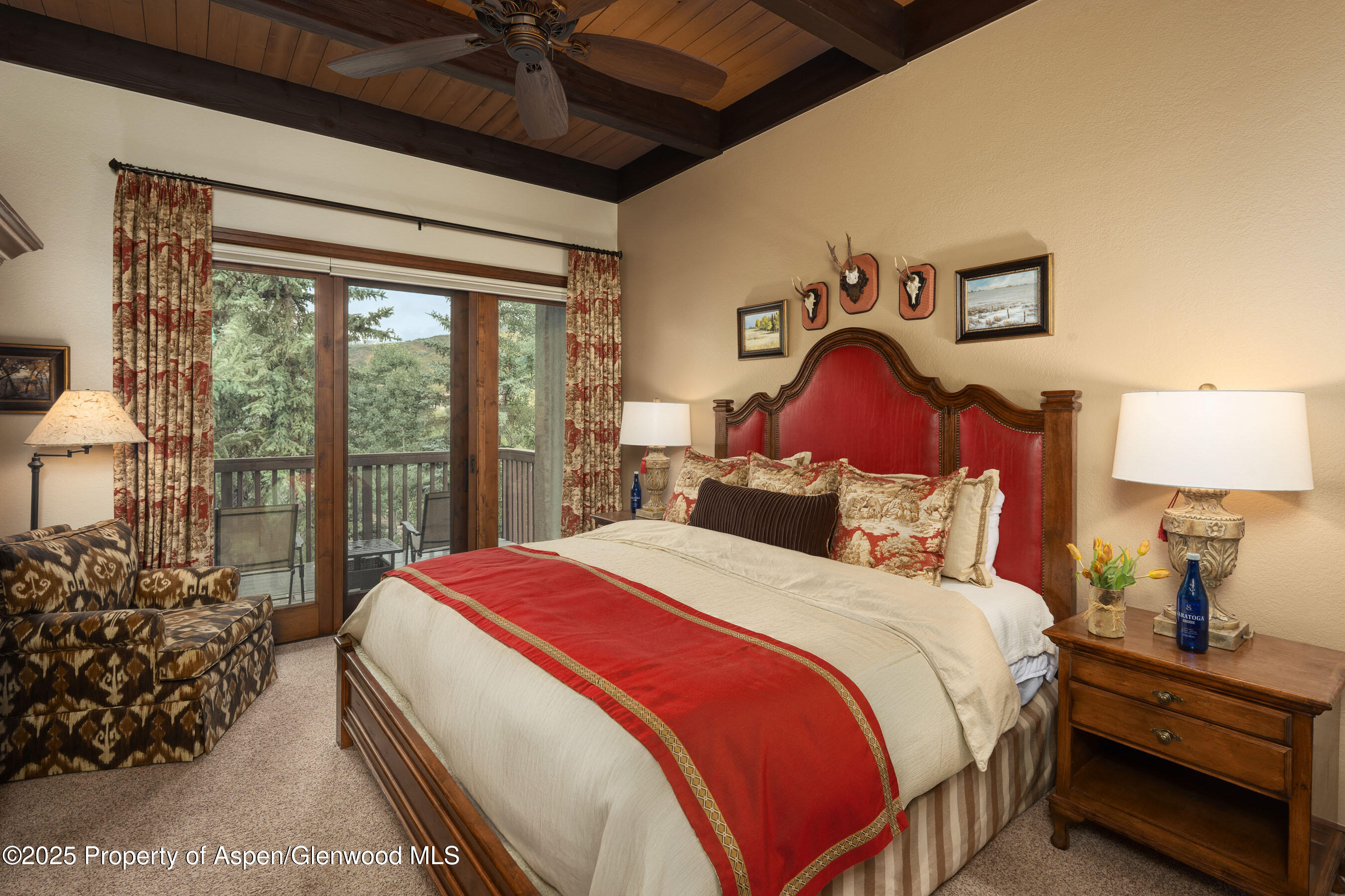 229 Faraway Road, Unit 28 Snowmass Village, CO 81615 - Photo 8 of 25 a bedroom with a bed a dresser next to a window