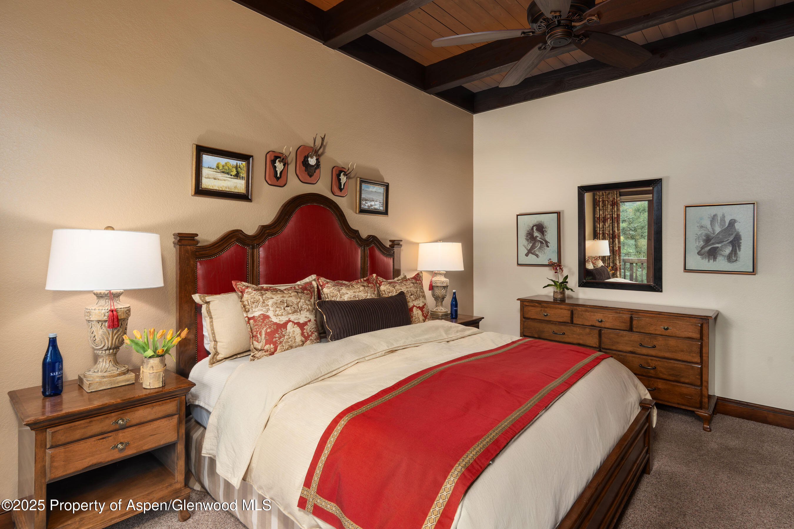 229 Faraway Road, Unit 28 Snowmass Village, CO 81615 - Photo 9 of 25 a bedroom with bed and a night stand