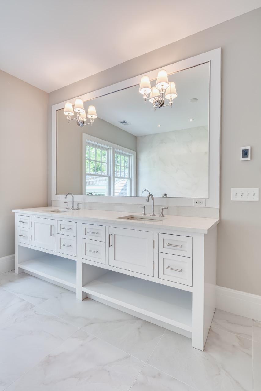 5 Top Sail Road Rowayton, CT 06853 - Photo 12 of 16 a bathroom with a sink vanity and a mirror