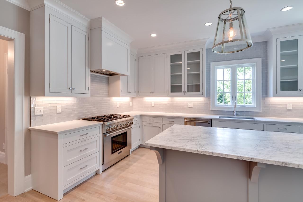 5 Top Sail Road Rowayton, CT 06853 - Photo 3 of 16 a kitchen with granite countertop a sink stainless steel appliances and cabinets
