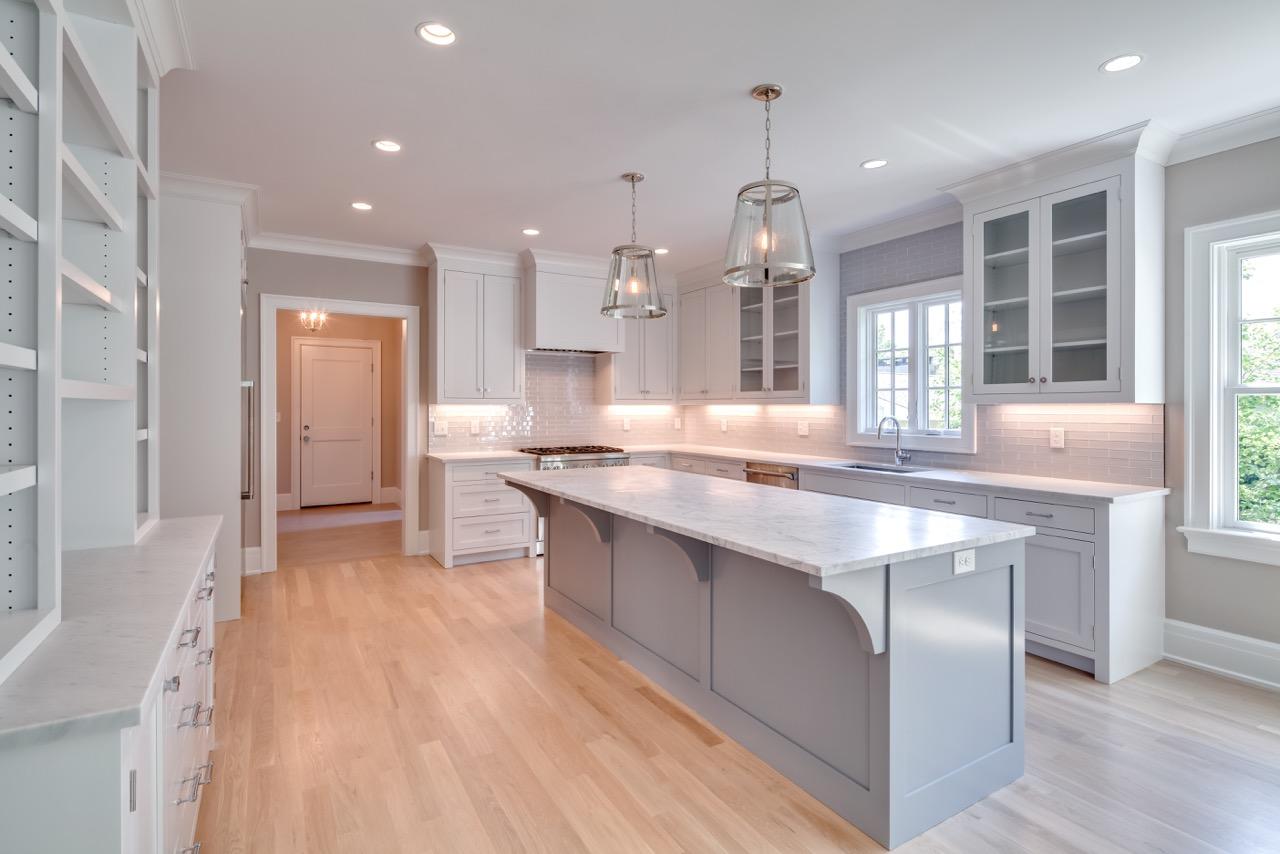 5 Top Sail Road Rowayton, CT 06853 - Photo 4 of 16 a large kitchen with kitchen island a large counter space and stainless steel appliances