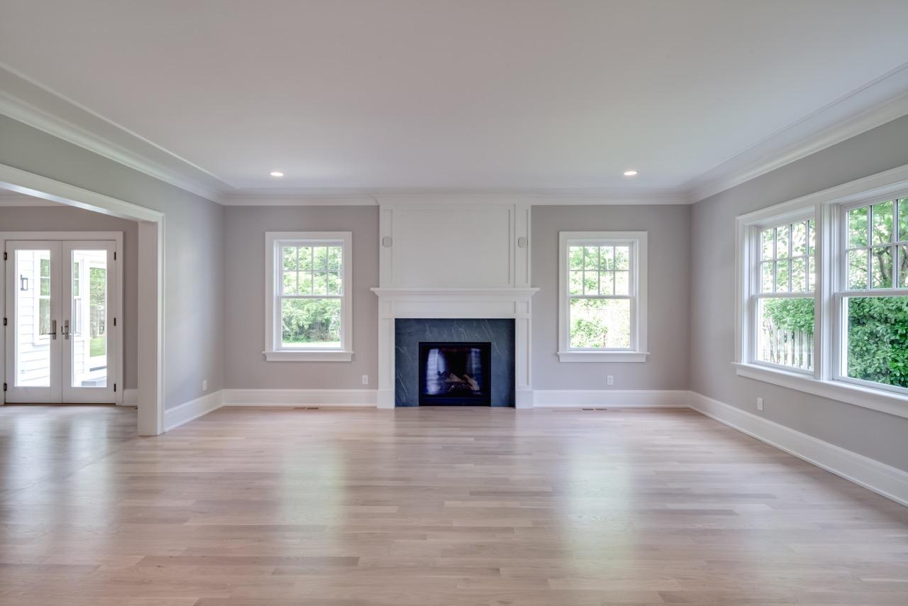 5 Top Sail Road Rowayton, CT 06853 - Photo 10 of 16 an empty room with windows and a fireplace