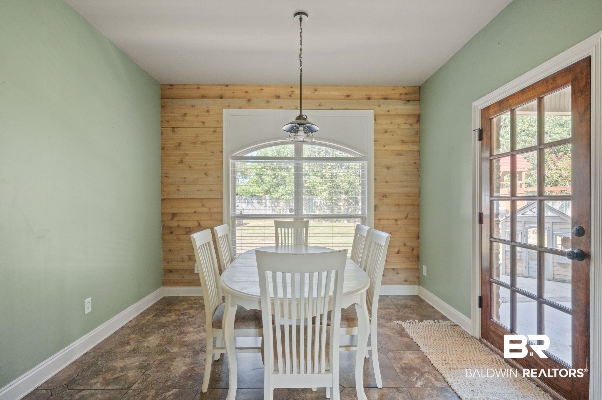 3879 Symphony Way West Semmes, AL 36575 - Photo 5 of 34 Tiled dining area with a wealth of natural light