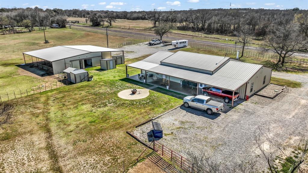 6500 Fm Road, Unit 1885 Weatherford, TX 76088 - Photo 30 of 40 a view of a lake with couches and wooden floor
